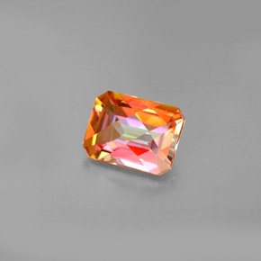 Topacio azotic multicolor natural de 1,92 ct, corte esmeralda, VS