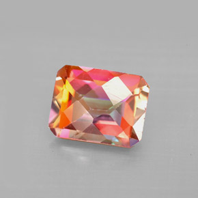 Topacio azotic multicolor natural de 2,56 ct, corte esmeralda, VS