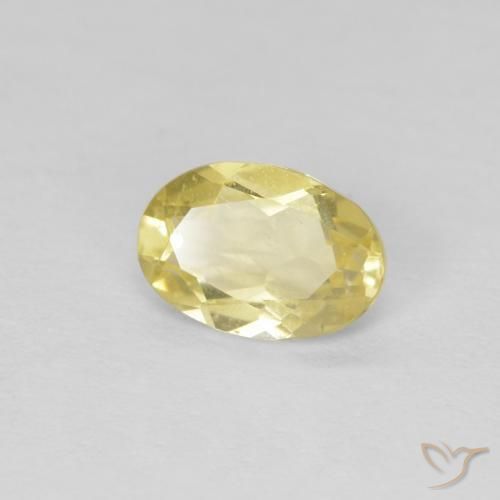 Berilo Amarillo dijón muy claro natural de 0.64 ct, Ovalada, VS