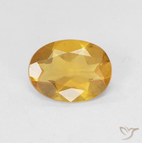 Berilo Dorado naranja natural de 1.32 ct, Ovalada, VS