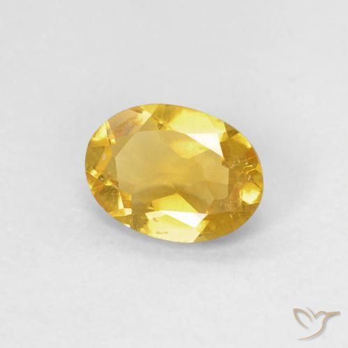 Berilo Dorado natural de 0.79 ct, Ovalada, VS