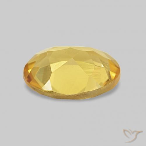 Berilo Dorado claro natural de 0.99 ct, Ovalada, VS