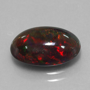Ópalo negro multicolor natural de 2,60 ct, corte óvalo, opaco