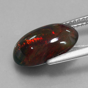 Ópalo negro multicolor natural de 2,60 ct, corte óvalo, opaco