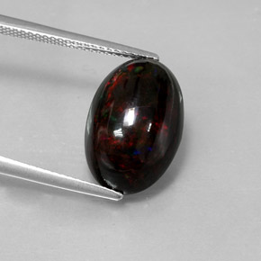 Ópalo negro multicolor natural de 5,05 ct, corte óvalo, opaco
