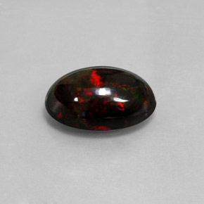 Ópalo negro multicolor natural de 5,05 ct, corte óvalo, opaco