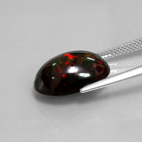 Ópalo negro multicolor natural de 5,05 ct, corte óvalo, opaco