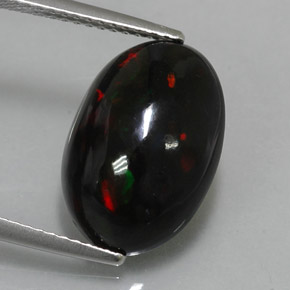 Ópalo negro multicolor natural de 4,34 ct, corte óvalo, opaco