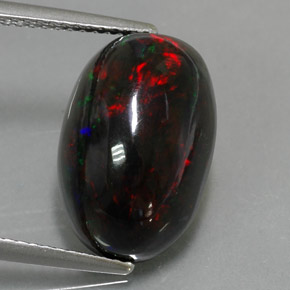 Ópalo negro multicolor natural de 5,81 ct, corte óvalo, opaco
