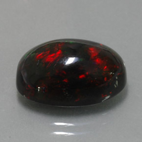 Ópalo negro multicolor natural de 5,81 ct, corte óvalo, opaco