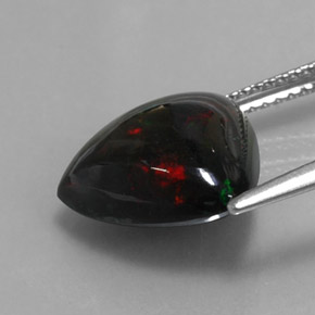 Ópalo negro multicolor natural de 3,55 ct, trillón, opaco
