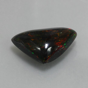 Ópalo negro multicolor natural de 3,94 ct, trillón, opaco