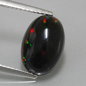 Ópalo negro multicolor natural de 2,83 ct, corte óvalo, opaco