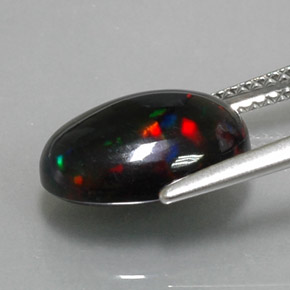 Ópalo negro multicolor natural de 2,83 ct, corte óvalo, opaco