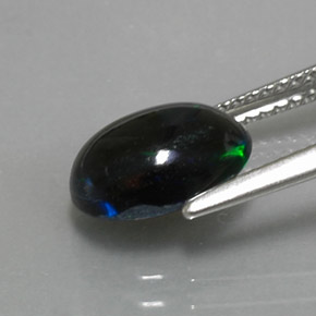 Ópalo negro multicolor natural de 1,62 ct, corte óvalo, opaco