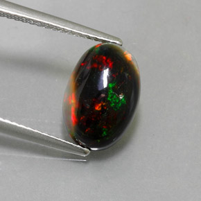 Ópalo negro multicolor natural de 2,26 ct, corte óvalo, opaco