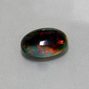 Ópalo negro multicolor natural de 2,26 ct, corte óvalo, opaco