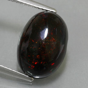Ópalo negro multicolor natural de 3,63 ct, corte óvalo, opaco