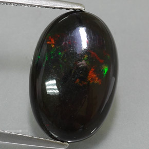 Ópalo negro multicolor natural de 4,78 ct, corte óvalo, opaco