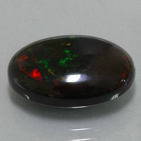 Ópalo negro multicolor natural de 4,78 ct, corte óvalo, opaco