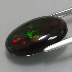 Ópalo negro multicolor natural de 4,78 ct, corte óvalo, opaco