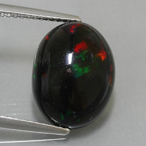 Ópalo negro multicolor natural de 4,50 ct, corte óvalo, opaco