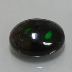 Ópalo negro multicolor natural de 4,50 ct, corte óvalo, opaco