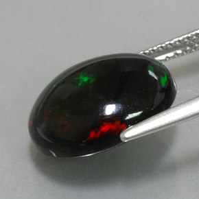 Ópalo negro multicolor natural de 4,50 ct, corte óvalo, opaco