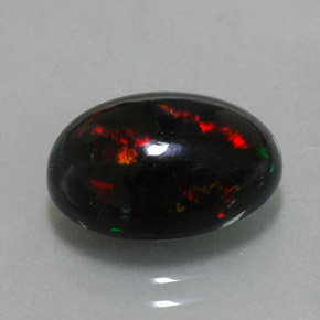 Ópalo negro multicolor natural de 3,75 ct, corte óvalo, opaco
