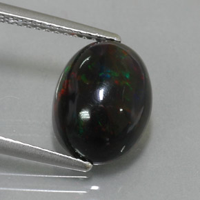 Ópalo negro multicolor natural de 2,73 ct, corte óvalo, opaco