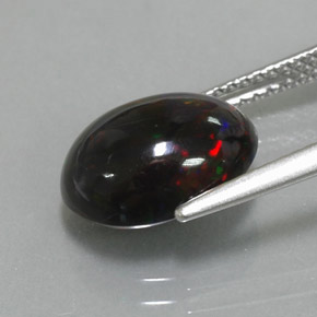Ópalo negro multicolor natural de 2,73 ct, corte óvalo, opaco