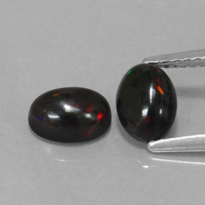 Gemas de ópalo negro multicolor natural de  ct, corte óvalo, opaco
