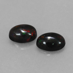 Gemas de ópalo negro multicolor natural de  ct, corte óvalo, opaco