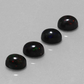Gemas de ópalo negro multicolor natural de  ct, corte óvalo, opaco
