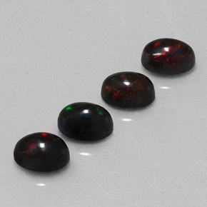 Gemas de ópalo negro multicolor natural de  ct, corte óvalo, opaco