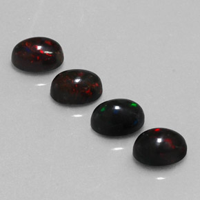 Gemas de ópalo negro multicolor natural de  ct, corte óvalo, opaco