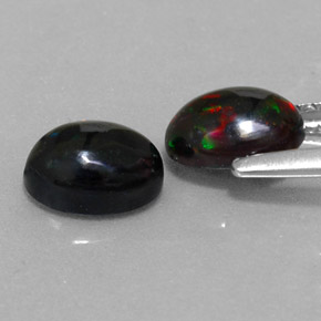Gemas de ópalo negro multicolor natural de  ct, corte óvalo, opaco