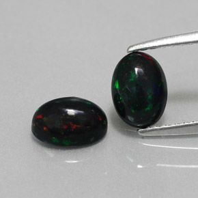 Gemas de ópalo negro multicolor natural de  ct, corte óvalo, opaco