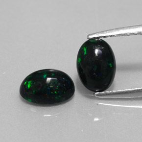 Gemas de ópalo negro multicolor natural de  ct, corte óvalo, opaco