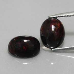 Gemas de ópalo negro multicolor natural de  ct, corte óvalo, opaco