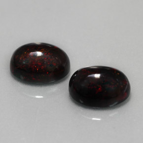 Gemas de ópalo negro multicolor natural de  ct, corte óvalo, opaco