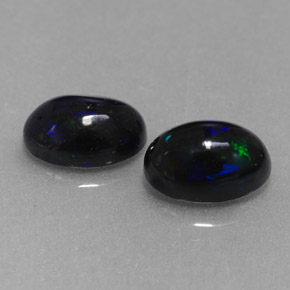 Gemas de ópalo negro multicolor natural de  ct, corte óvalo, opaco