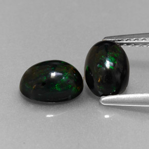 Gemas de ópalo negro multicolor natural de  ct, corte óvalo, opaco