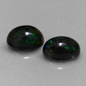 Gemas de ópalo negro multicolor natural de  ct, corte óvalo, opaco