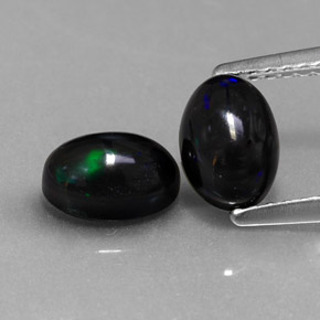 Gemas de ópalo negro multicolor natural de  ct, corte óvalo, opaco