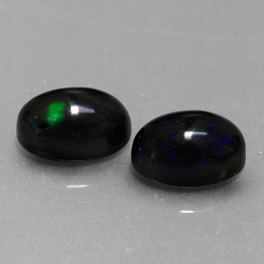 Gemas de ópalo negro multicolor natural de  ct, corte óvalo, opaco