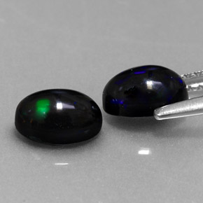 Gemas de ópalo negro multicolor natural de  ct, corte óvalo, opaco