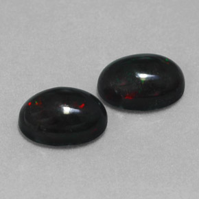 Gemas de ópalo negro multicolor natural de  ct, corte óvalo, opaco