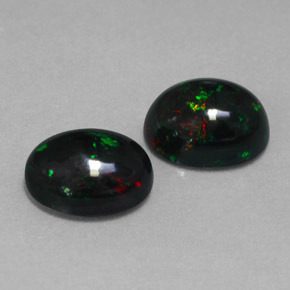 Gemas de ópalo negro multicolor natural de  ct, corte óvalo, opaco