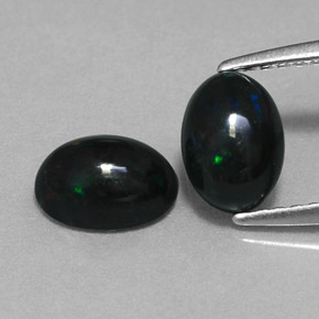 Gemas de ópalo negro multicolor natural de  ct, corte óvalo, opaco